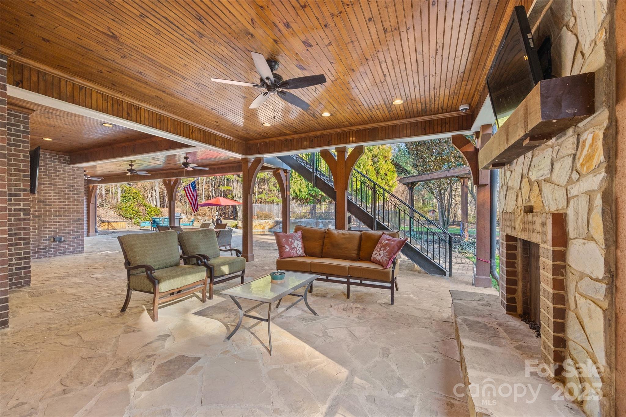 1024 State Rd S-46-181 York, SC 29745 - Photo 29 of 45 a outdoor space with lots of chairs and a couch