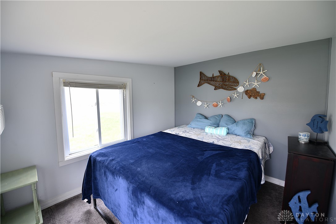 5445 Behm Road, Unit 15 Celina, OH 45822 - Photo 23 of 49 This cozy bedroom offers a peaceful retreat with natural light.