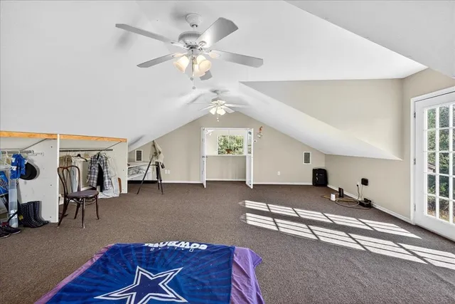 a living room with furniture window and wooden floor