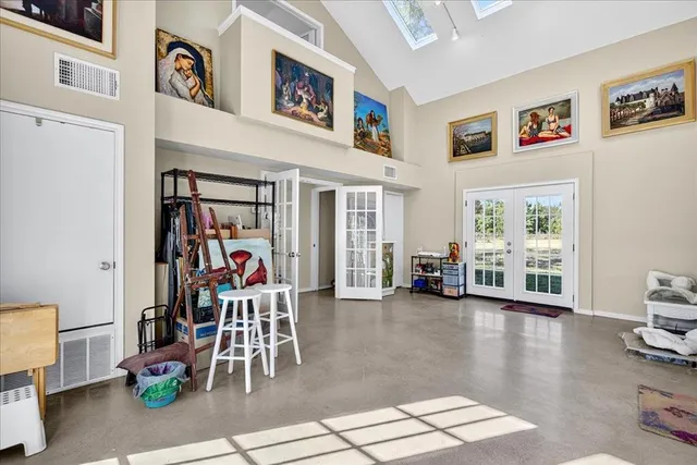 a view of a livingroom with furniture and toys