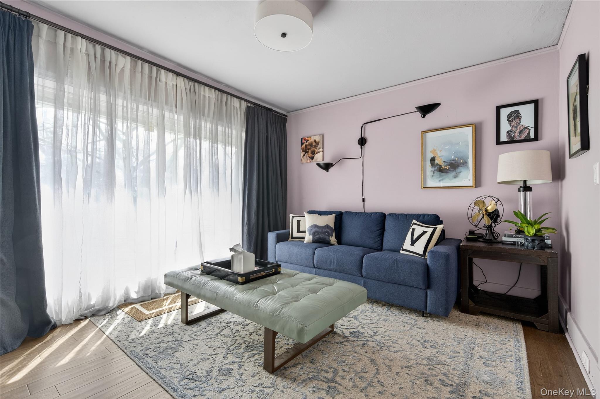 3 Beacon Hill Road Port Washington, NY 11050 - Photo 22 of 43 a living room with furniture and a window