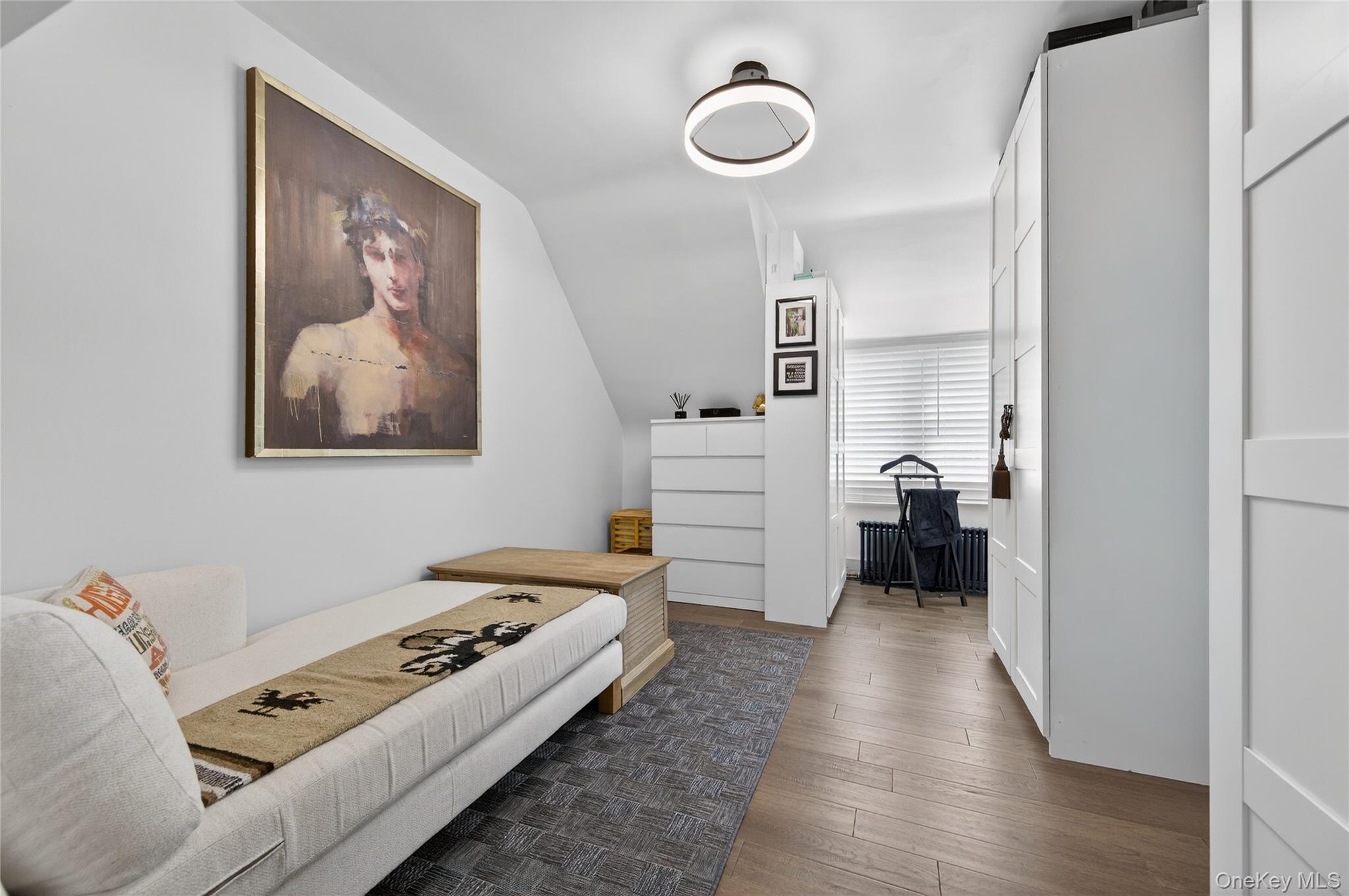 3 Beacon Hill Road Port Washington, NY 11050 - Photo 23 of 43 a room with furniture and a view of bathroom