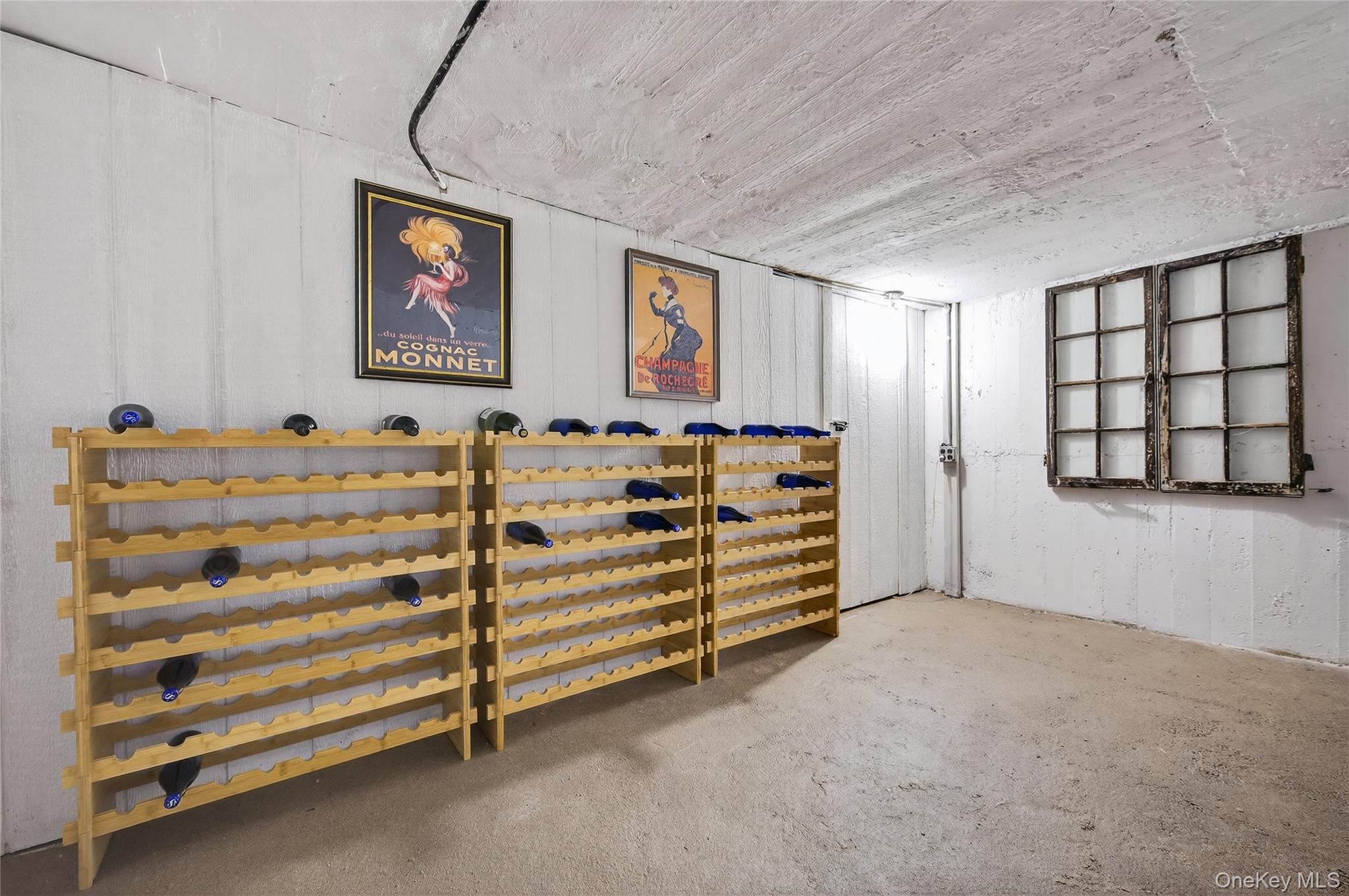 3 Beacon Hill Road Port Washington, NY 11050 - Photo 31 of 43 a view of a livingroom with furniture and staircase