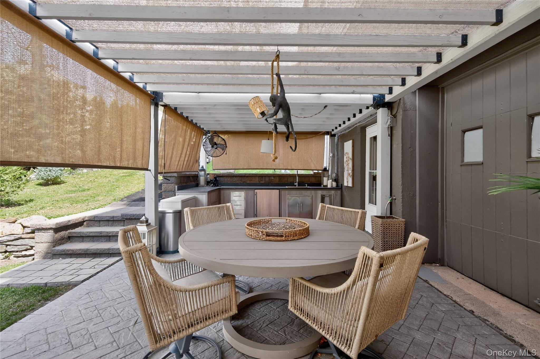 3 Beacon Hill Road Port Washington, NY 11050 - Photo 37 of 43 a view of a dining room with furniture window and outside view
