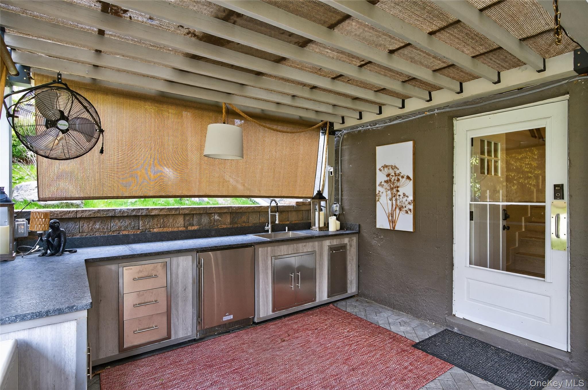 3 Beacon Hill Road Port Washington, NY 11050 - Photo 38 of 43 a view of a hallway with washer and dryer