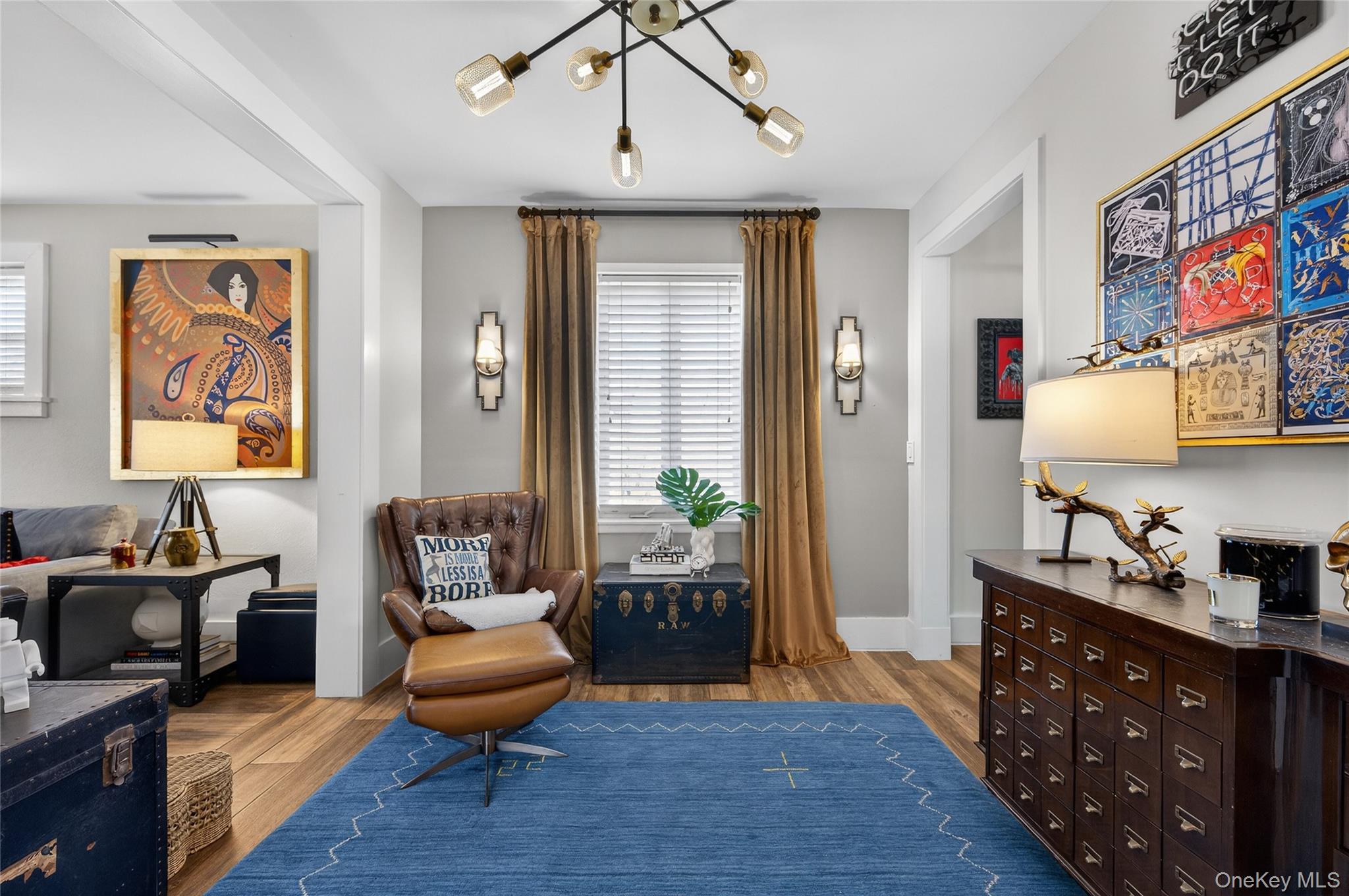 3 Beacon Hill Road Port Washington, NY 11050 - Photo 5 of 43 a living room with furniture and a flat screen tv