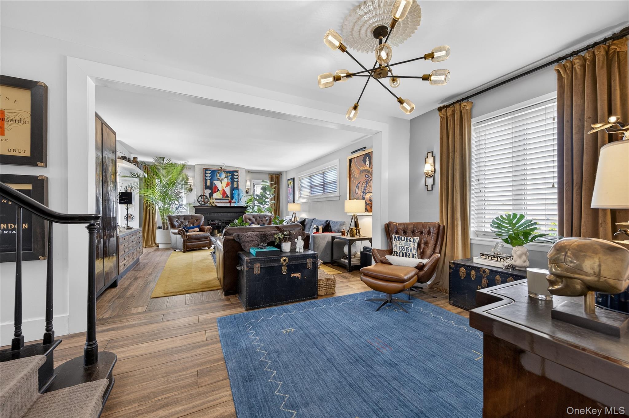 3 Beacon Hill Road Port Washington, NY 11050 - Photo 9 of 43 a living room with furniture kitchen view and a large window