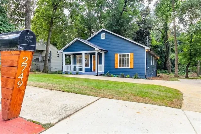 a view of outdoor space yard and front view of a house