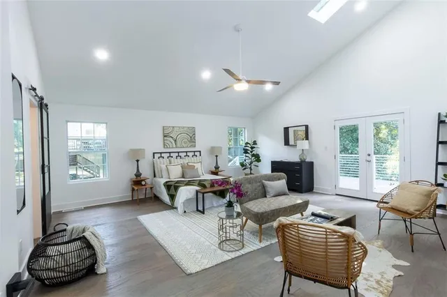 a living room with furniture rug and window