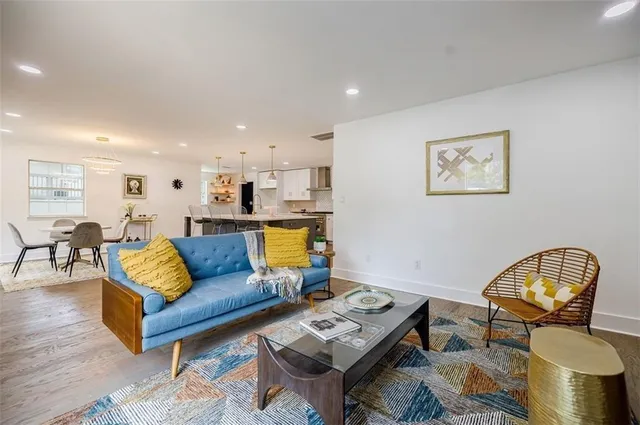 a living room with furniture and a couch