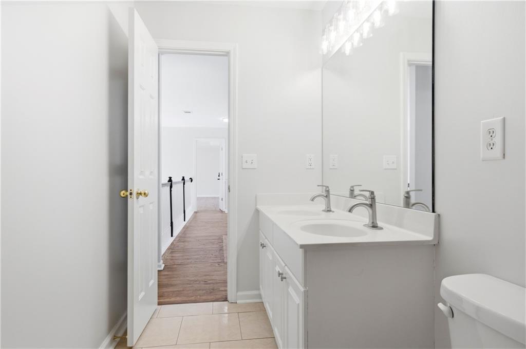 110 Mayes Farm Road Northwest Marietta, GA 30064 - Photo 33 of 49 a bathroom with a sink and a mirror