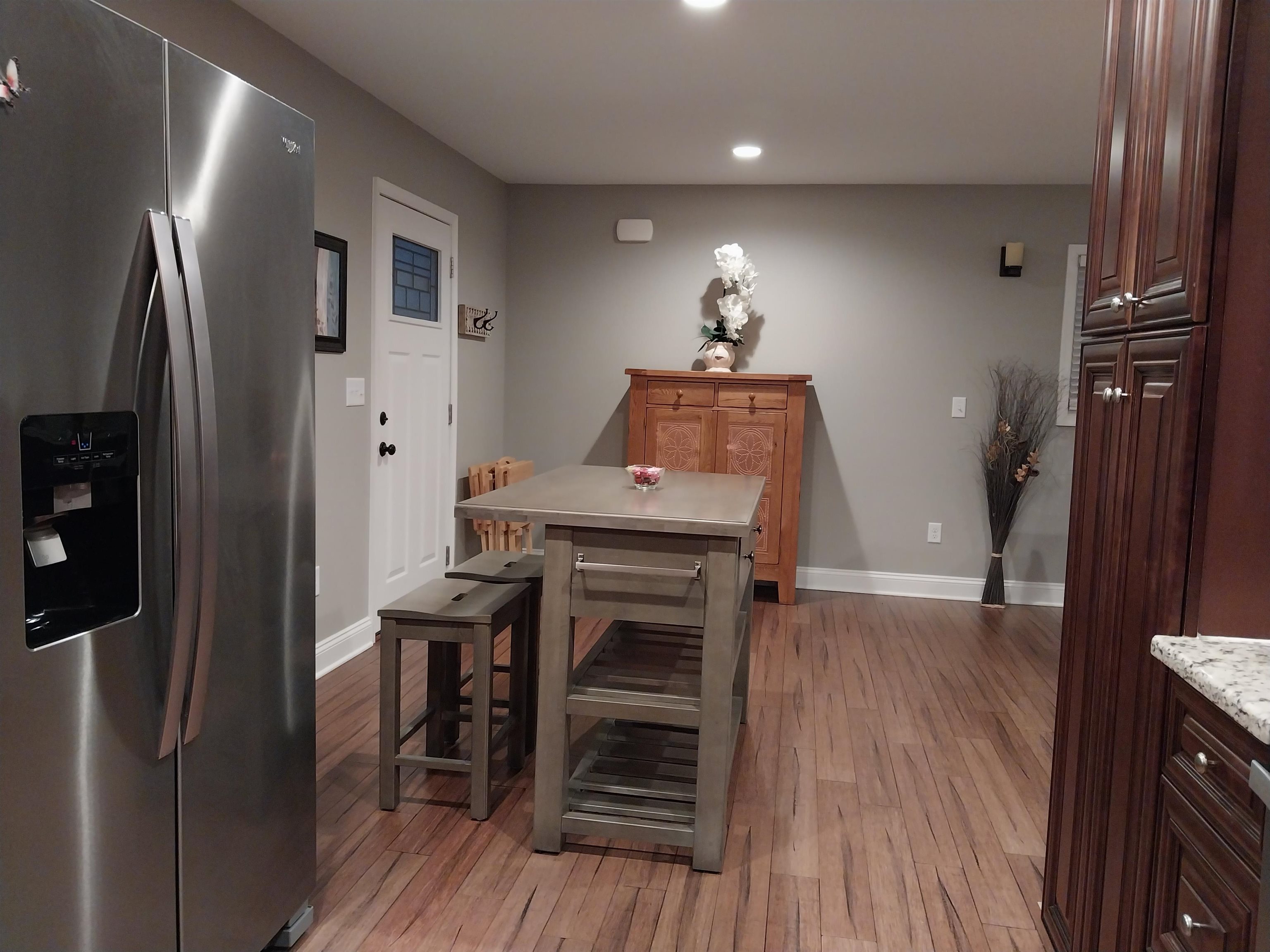 7 Rolla Mill Road Verona, VA 24482 - Photo 15 of 59 a living room with stainless steel appliances furniture a fireplace and wooden floor