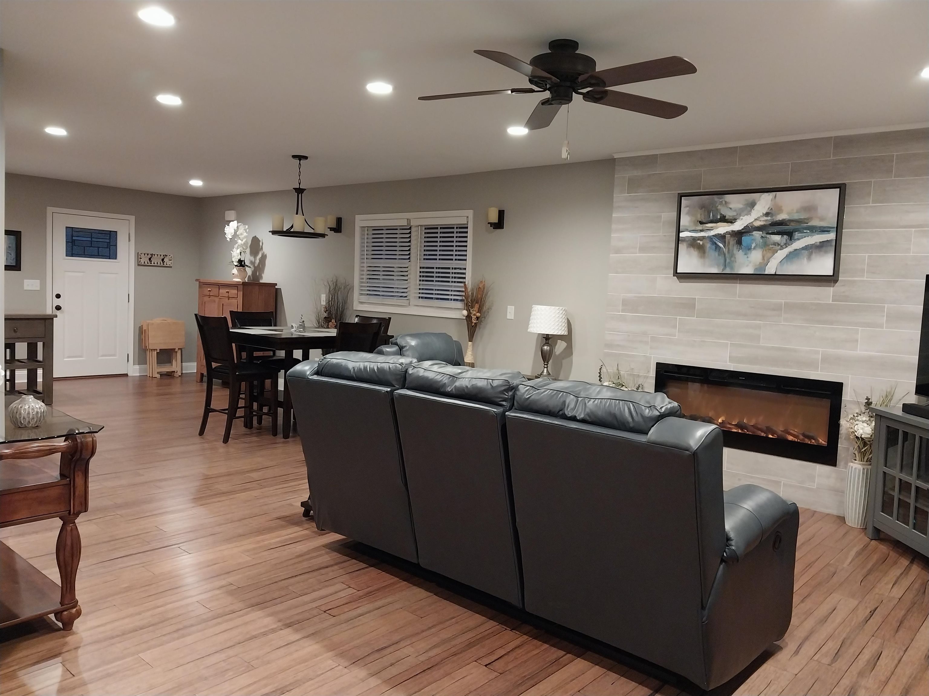 7 Rolla Mill Road Verona, VA 24482 - Photo 21 of 59 a living room with furniture wooden floor and a fireplace