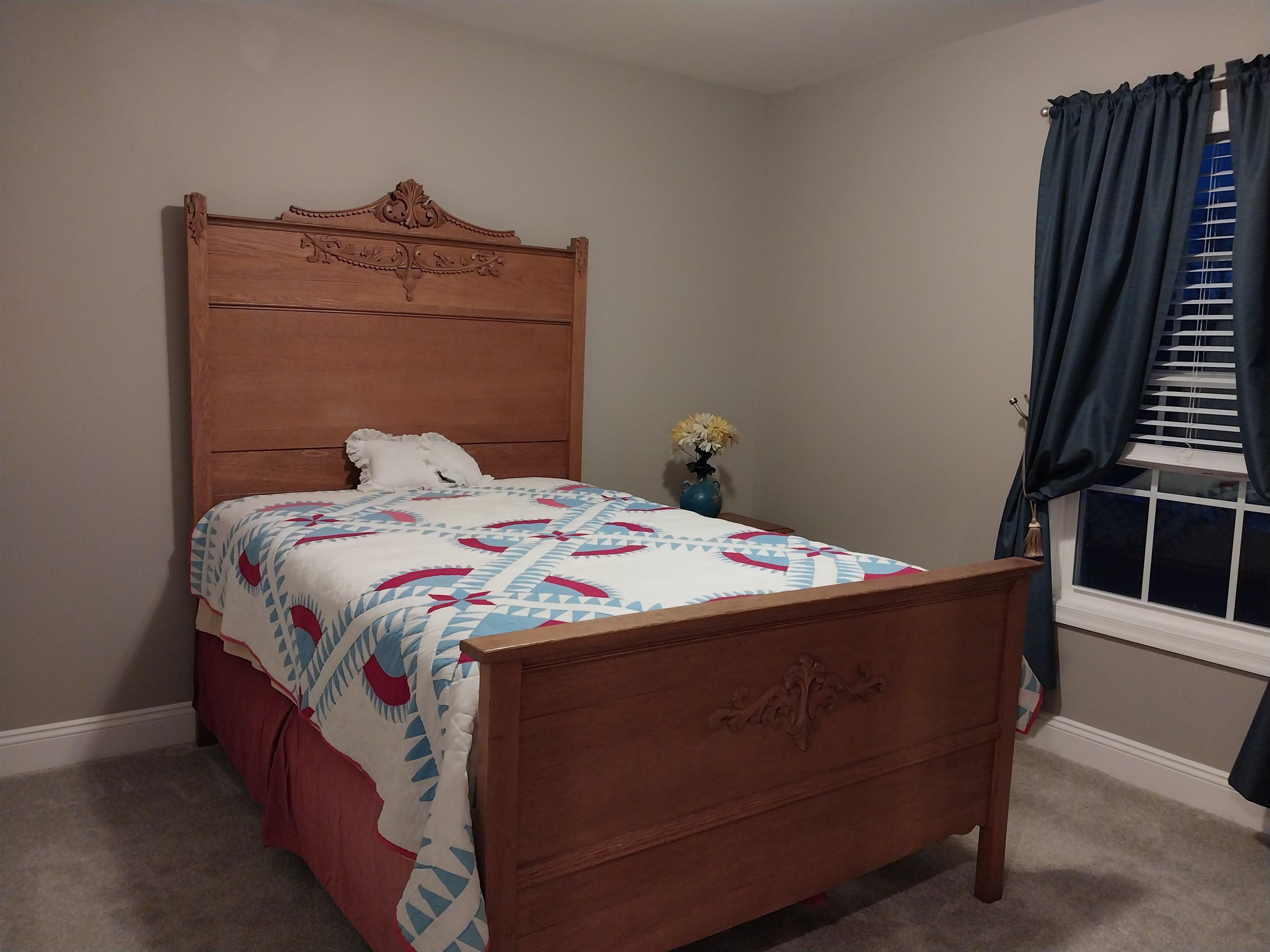 7 Rolla Mill Road Verona, VA 24482 - Photo 30 of 59 a bed sitting in a bedroom next to a window