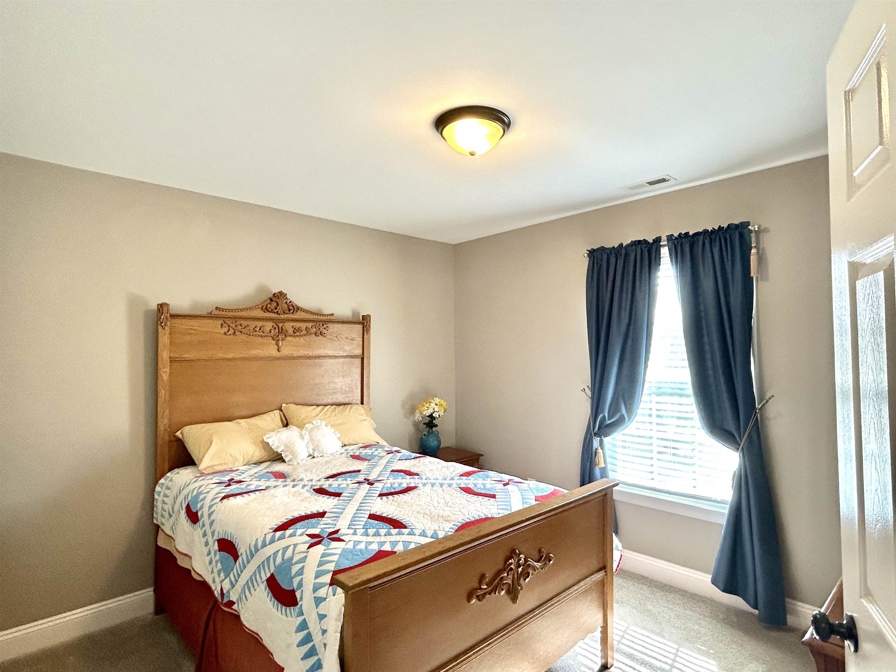 7 Rolla Mill Road Verona, VA 24482 - Photo 32 of 59 a bedroom with a bed and a window