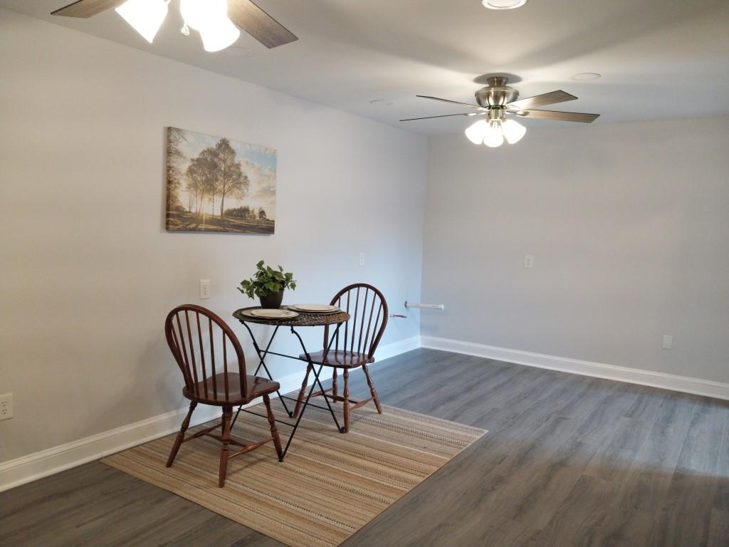 7 Rolla Mill Road Verona, VA 24482 - Photo 42 of 59 a view of a dining room with furniture and wooden floor