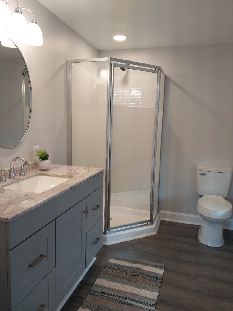 7 Rolla Mill Road Verona, VA 24482 - Photo 43 of 59 a bathroom with a granite countertop sink toilet and shower