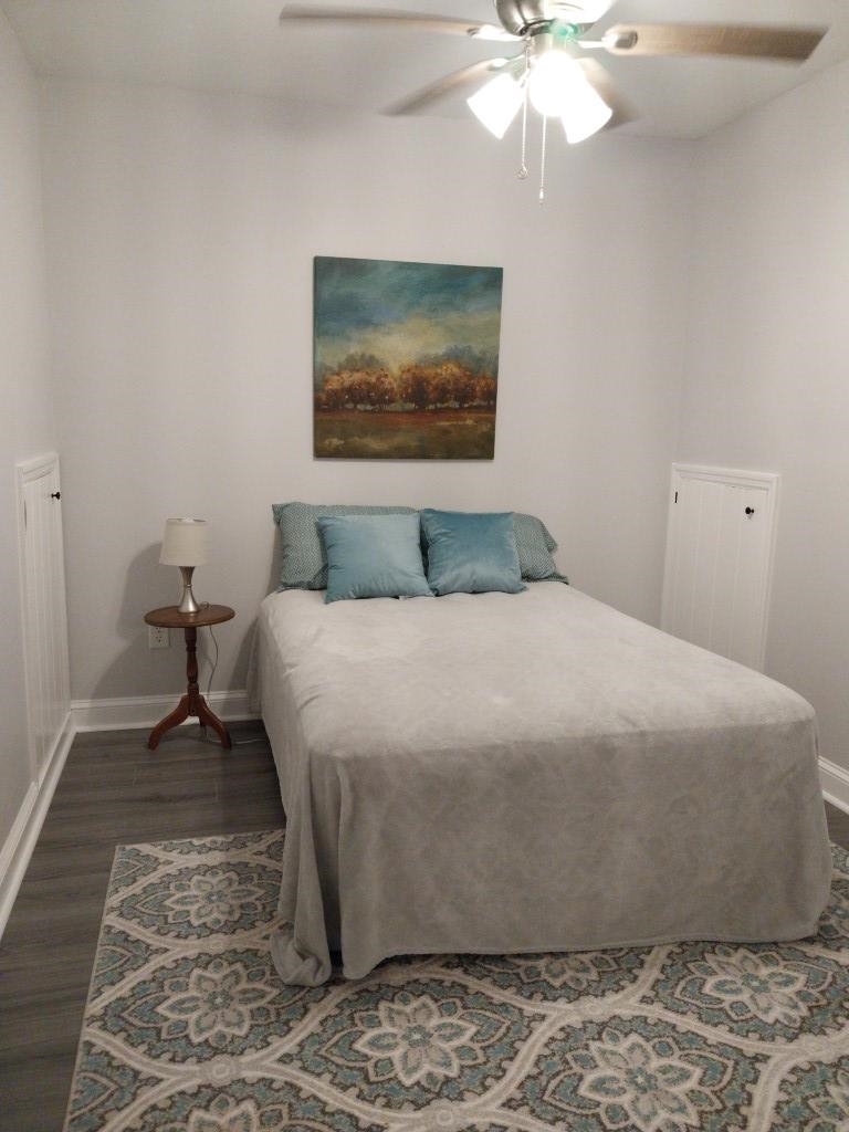 7 Rolla Mill Road Verona, VA 24482 - Photo 44 of 59 a bedroom with a bed and a chandelier