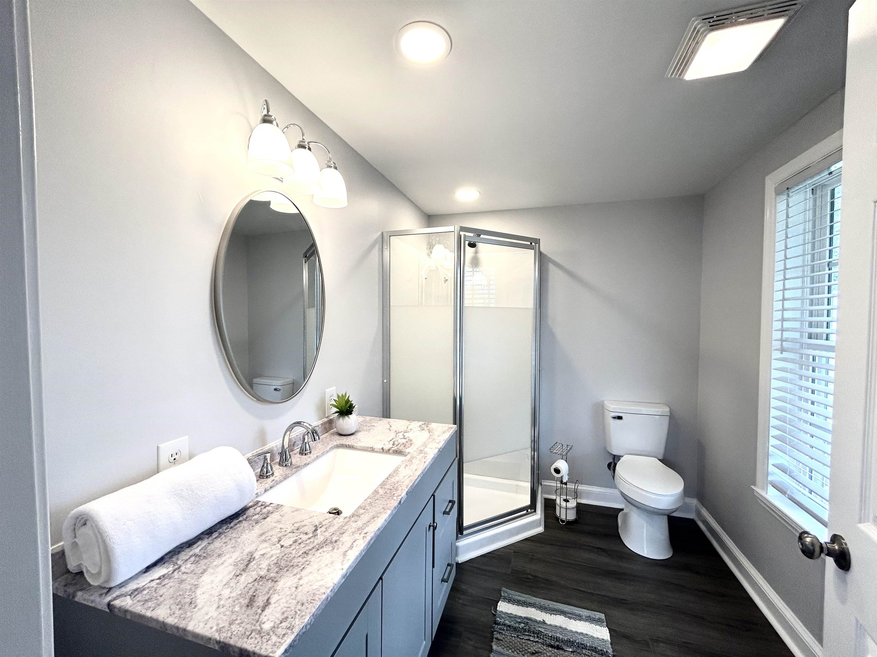 7 Rolla Mill Road Verona, VA 24482 - Photo 45 of 59 a bathroom with a granite countertop sink a toilet and a mirror