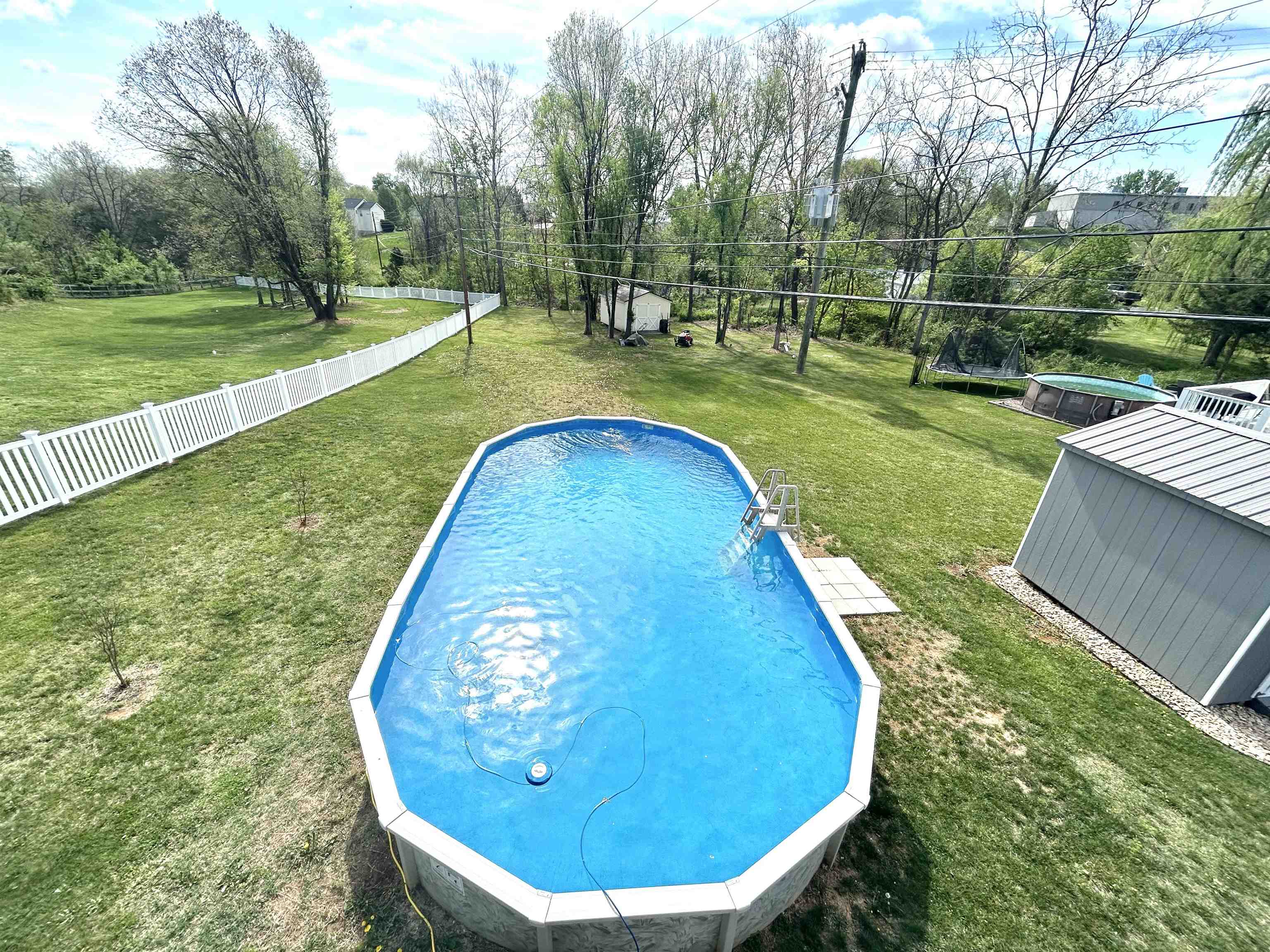 7 Rolla Mill Road Verona, VA 24482 - Photo 48 of 59 a view of a swimming pool with a swimming pool and sitting area