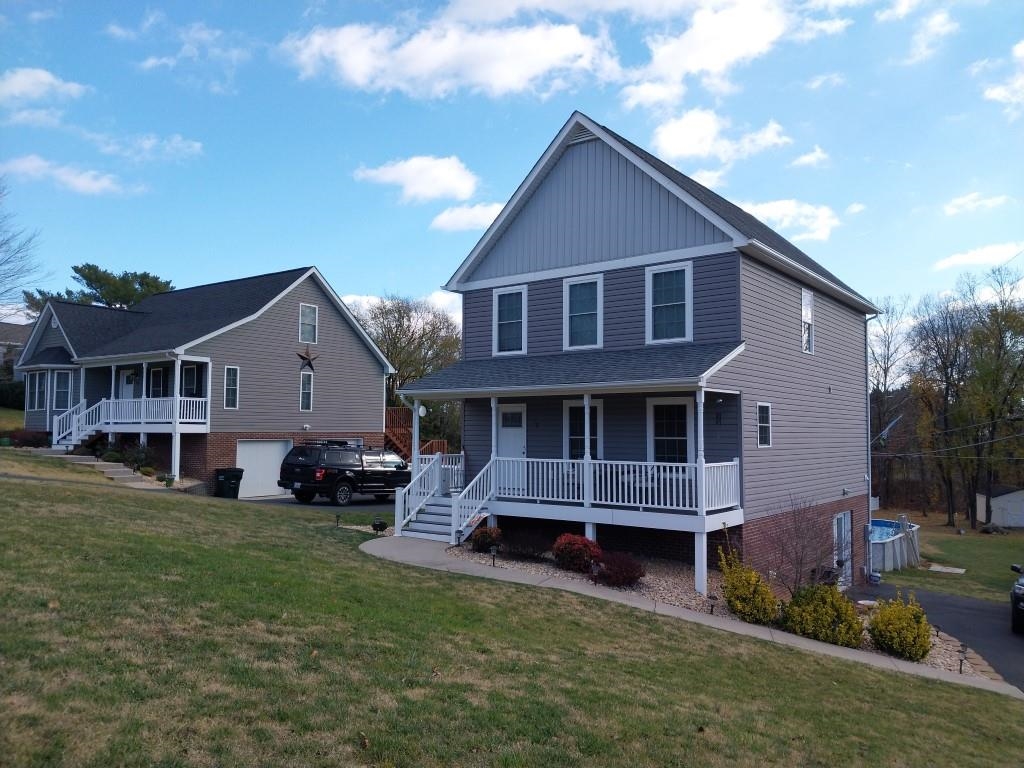 7 Rolla Mill Road Verona, VA 24482 - Photo 7 of 59 a front view of a house with a yard
