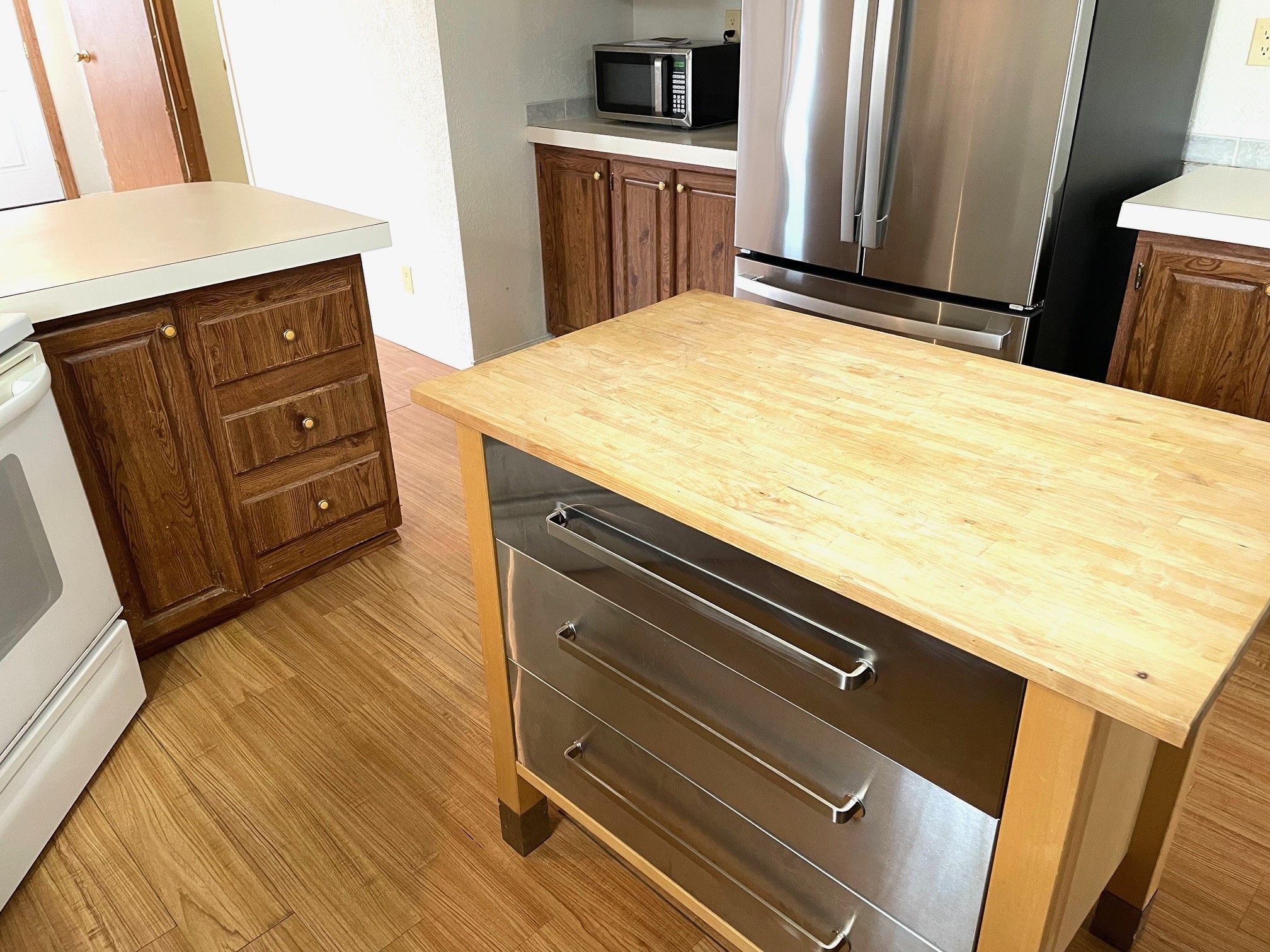 800 Archie Lane Belton, TX 76513 - Photo 18 of 32 The Butcher Block Island has stainless storage drawers for your utensils and 'stuff'.