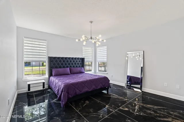 a kitchen with stainless steel appliances a sink stove and cabinets