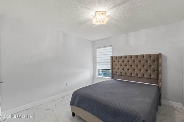 a view of a workspace with furniture