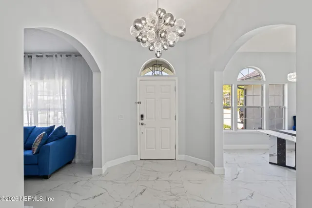 a view of hall way with mirror