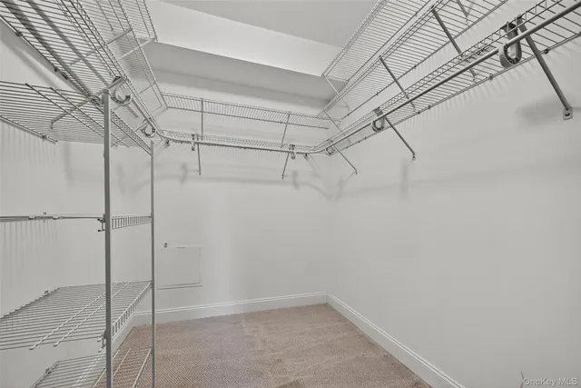 a view of a room with racks on the wall