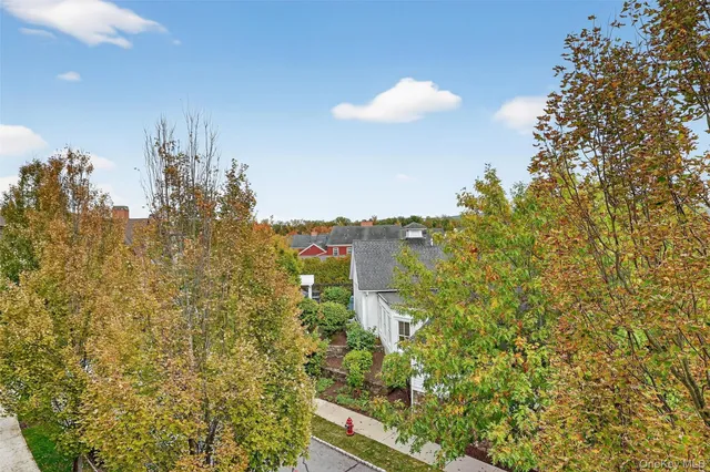 a view of a lake with a building in the background