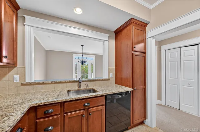 a bathroom with a sink a mirror and a shower