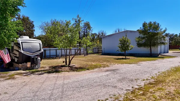 a view of a swimming pool and an outdoor space