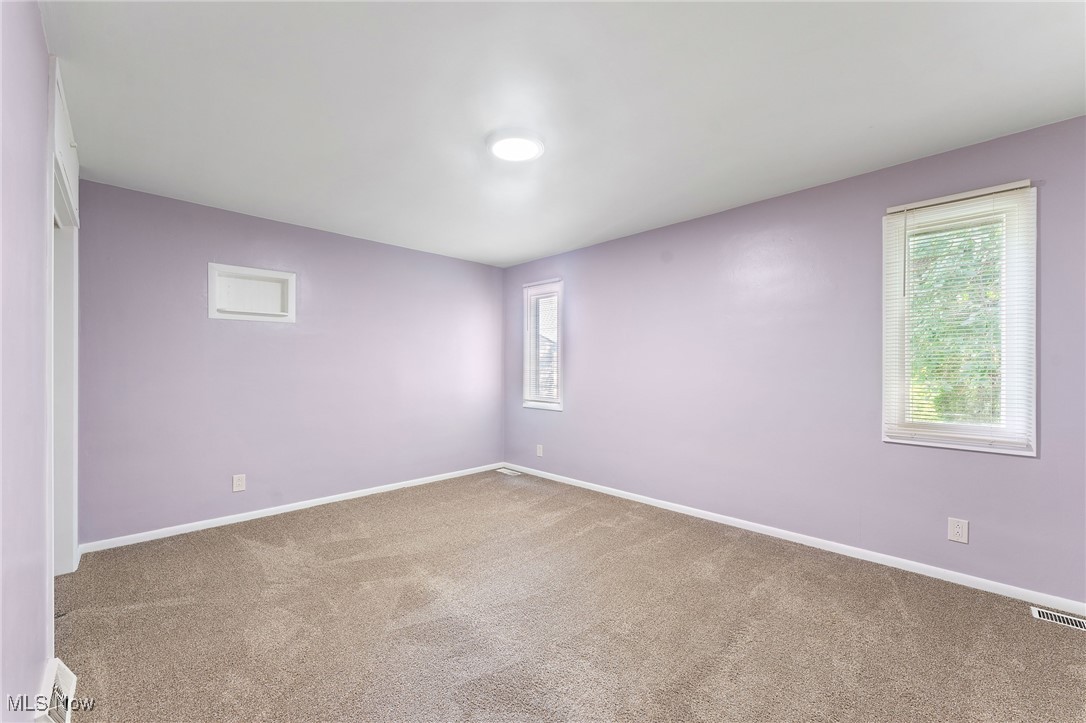 1723 Mathews Road Youngstown, OH 44514 - Photo 23 of 37 Empty room featuring carpet floors