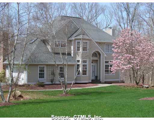 173 Fairview Road Westbrook, CT 06498 - Photo 1 of 1 a front view of a house with a garden