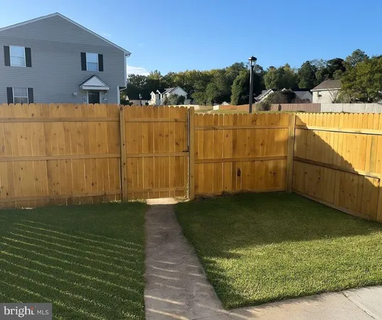 a view of a lake with a yard