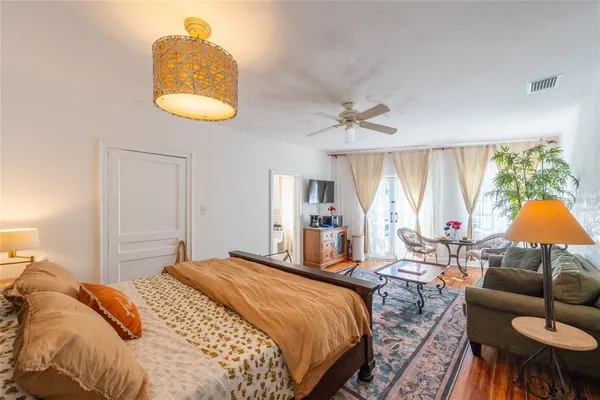 a living room with furniture and a window