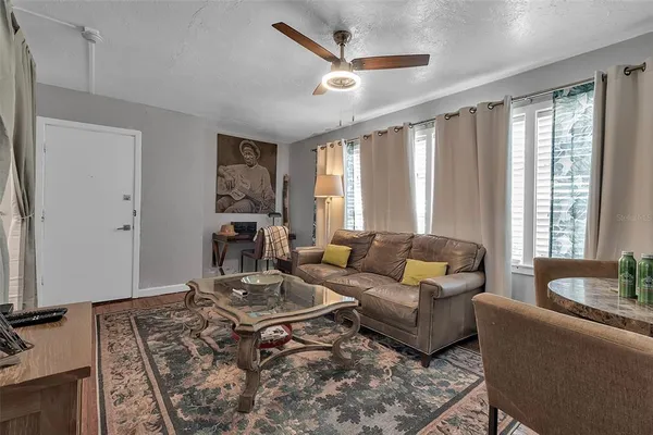 a bedroom with a bed and a dresser in it