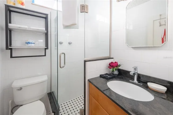 a view of a building with sitting area