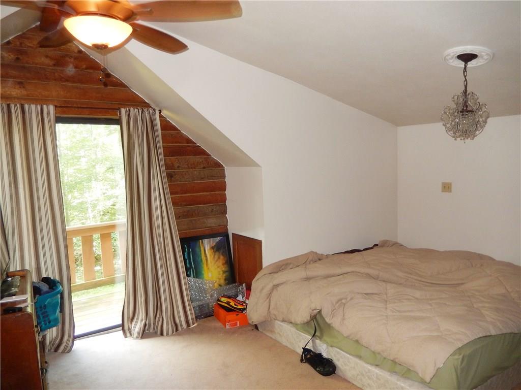 158 Sycamore Road Acme, PA 15610 - Photo 13 of 17 Wake up and take a walk out onto the private bedroom balcony.