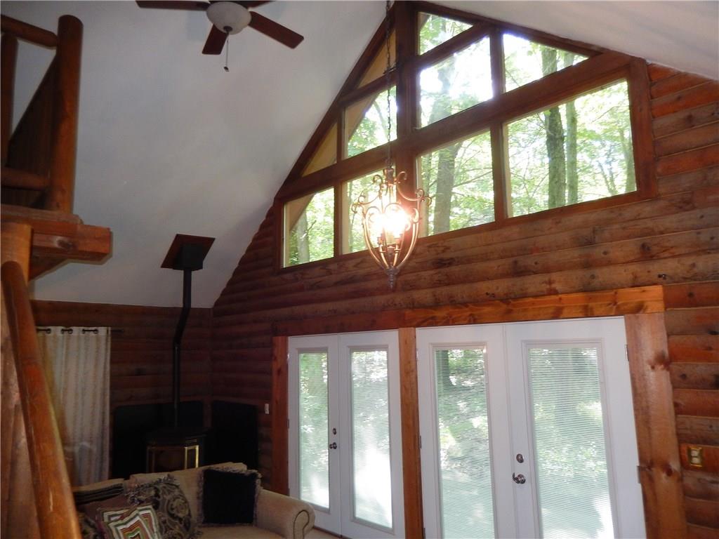 158 Sycamore Road Acme, PA 15610 - Photo 3 of 17 Charming wood and vaulted ceilings create a dramatic space for entertaining.
