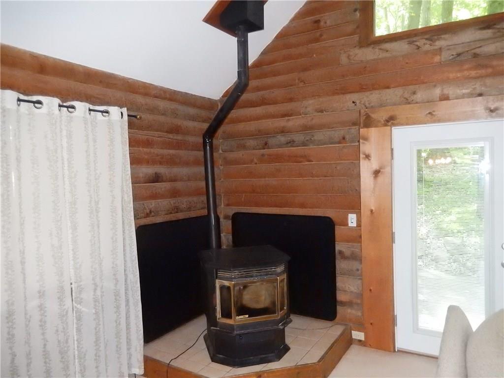 158 Sycamore Road Acme, PA 15610 - Photo 5 of 17 Stay warm in the winters with the pellet stove.