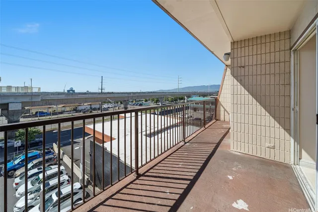 a view of balcony with furniture