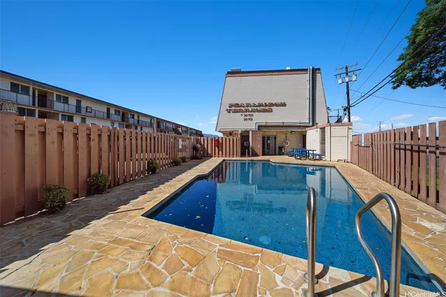 a view of balcony with wooden floor