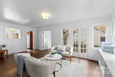 a view of a hallway with a window