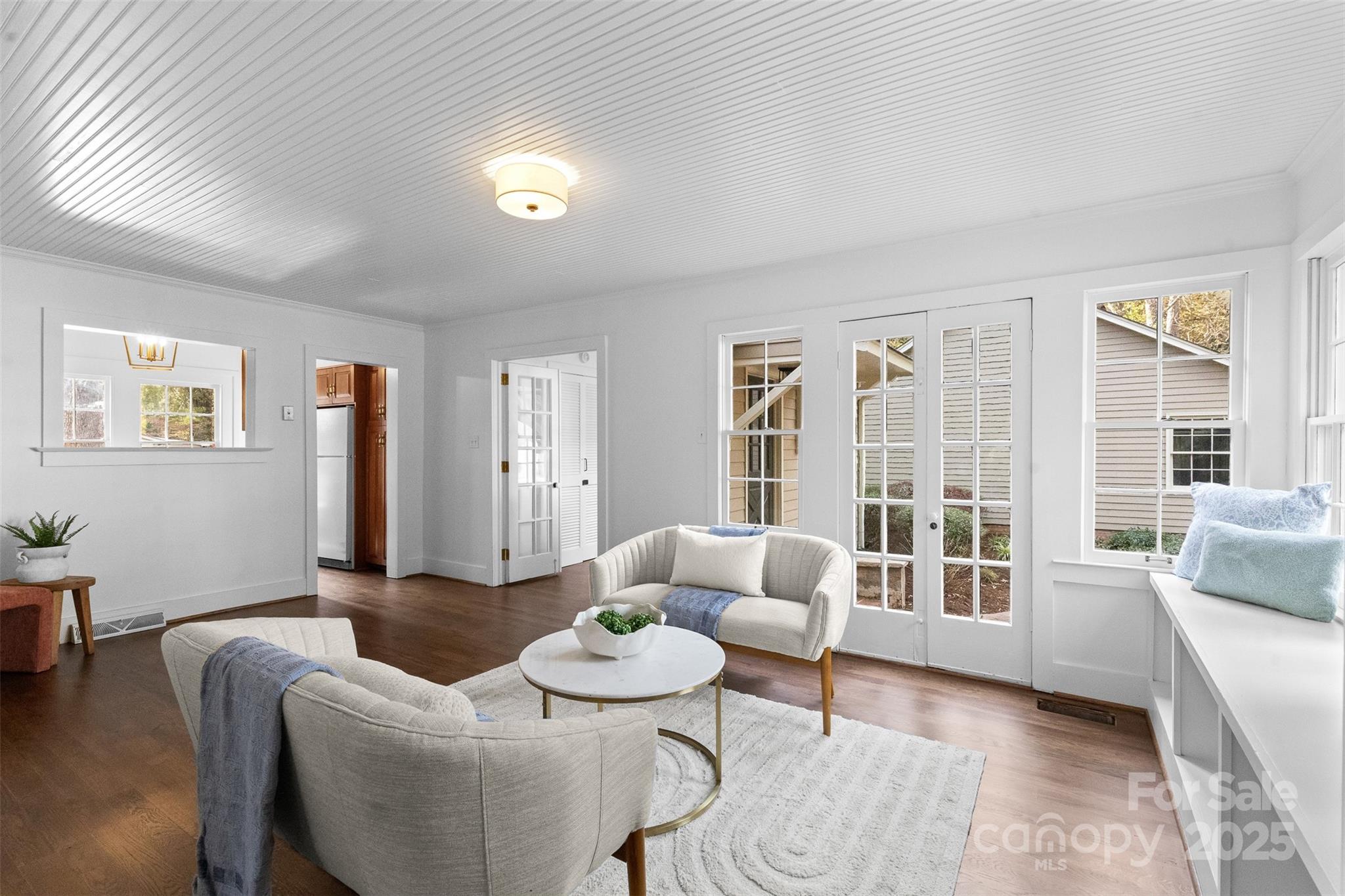 5607 Matthews-Mint Hill Road Charlotte, NC 28227 - Photo 21 of 45 a living room with furniture and a large window