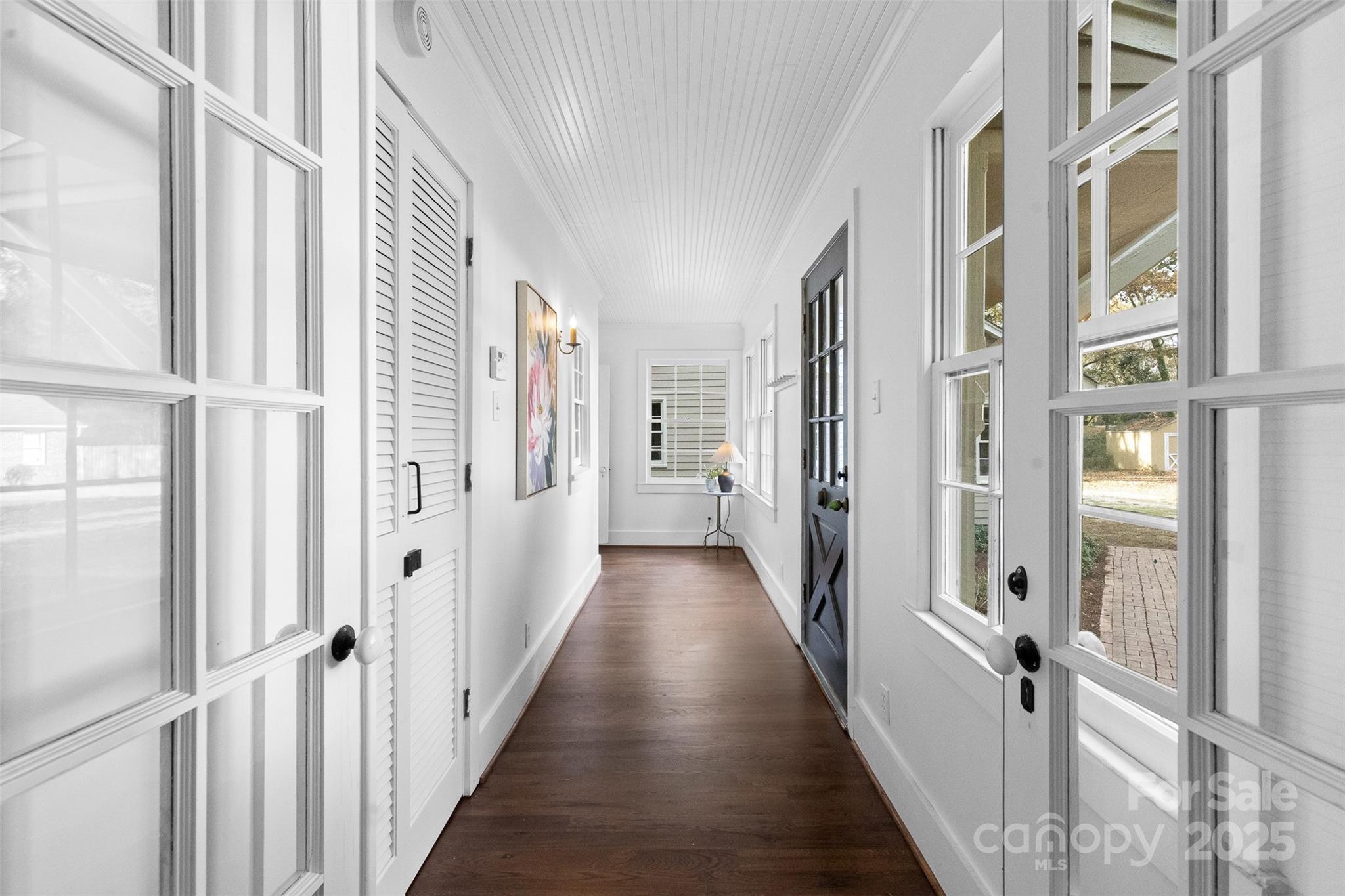 5607 Matthews-Mint Hill Road Charlotte, NC 28227 - Photo 22 of 45 a view of a hallway with a window