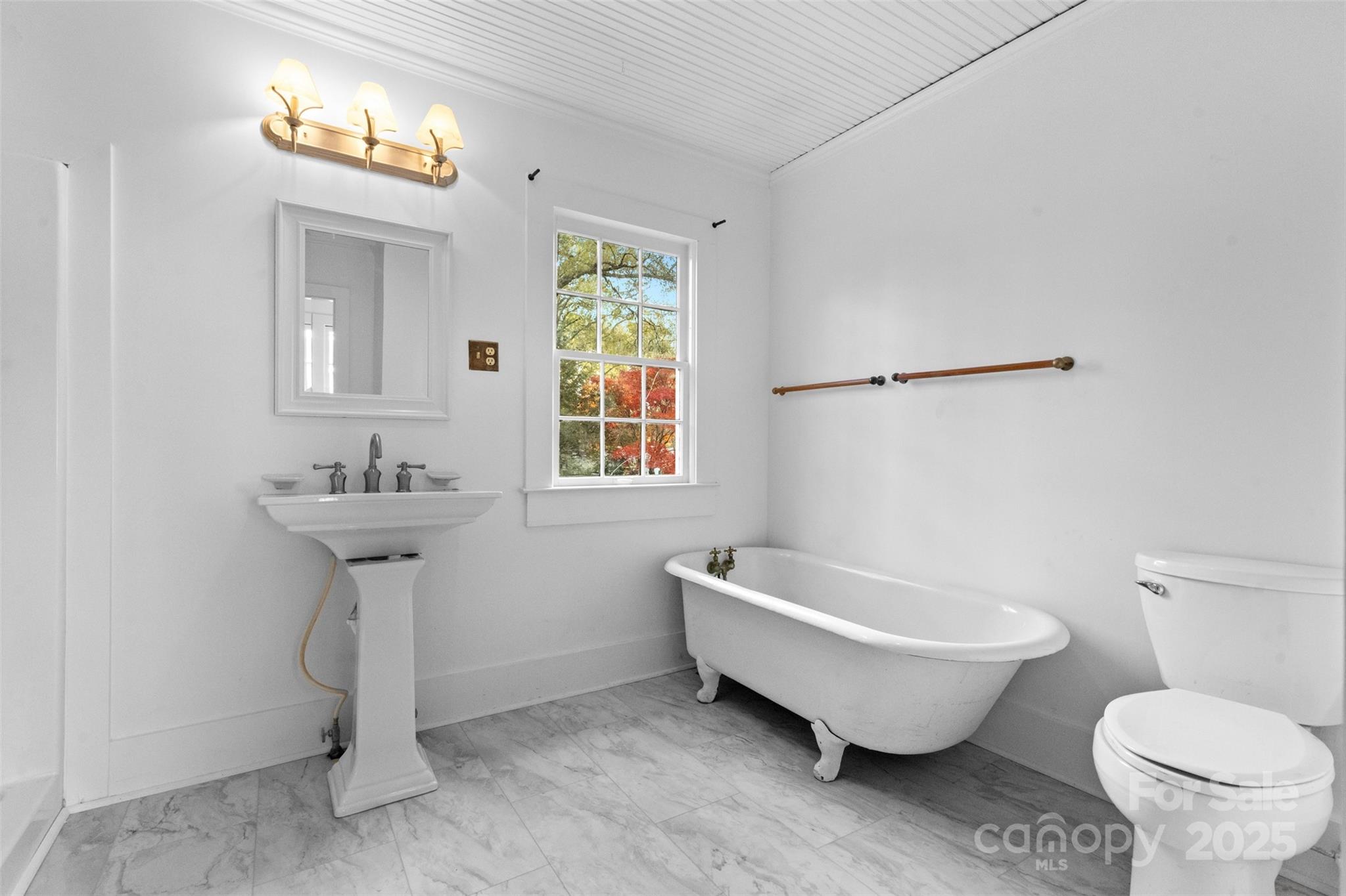 5607 Matthews-Mint Hill Road Charlotte, NC 28227 - Photo 26 of 45 a bathroom with a sink toilet and a mirror