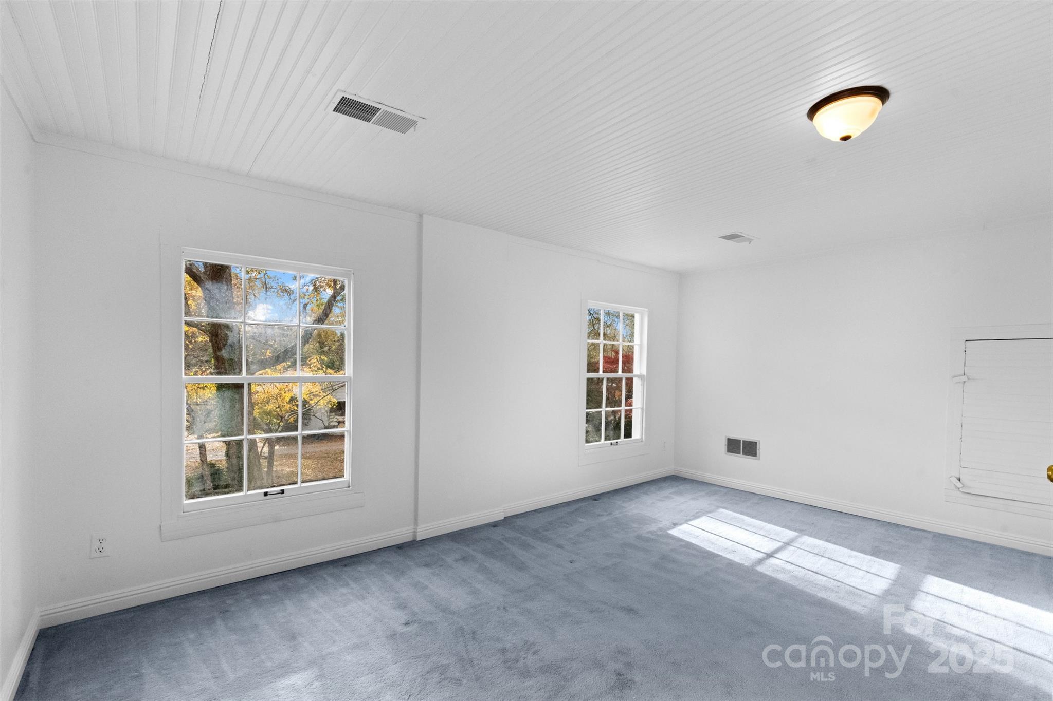 5607 Matthews-Mint Hill Road Charlotte, NC 28227 - Photo 31 of 45 a view of an empty room with a window