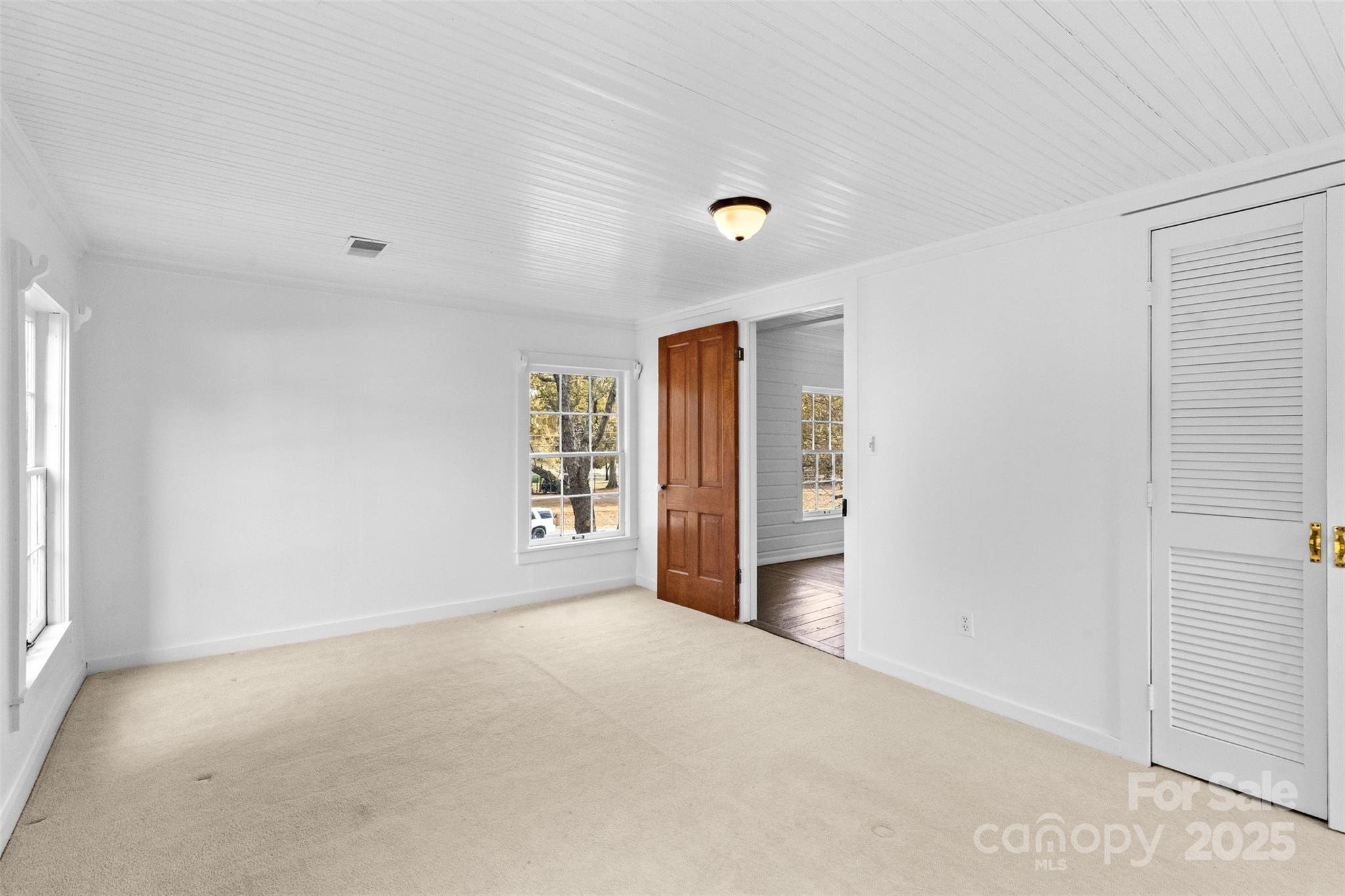 5607 Matthews-Mint Hill Road Charlotte, NC 28227 - Photo 34 of 45 a view of an empty room with a window